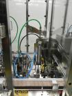 Used Intellitech IntelliFiller Model AFS I-3500C Liquid Filler Stopper and Screw / Crimp Capper. Monoblock Machine is capable of speeds up to 45 (1-up) and 90 (2-up) containers per minute. Machine ac...