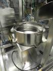 Used Intellitech IntelliFiller Model AFS I-3500C Liquid Filler Stopper and Screw / Crimp Capper. Monoblock Machine is capable of speeds up to 45 (1-up) and 90 (2-up) containers per minute. Machine ac...