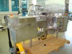 Used Strunk (Bosch) Ampoule Filling and Flame Sealing Machine. Two (2) station - filler with rotary valve pumps for 1 - 5 ml and 5 - 20 ml, output 7,200 pieces/h (1/2/3 ml), 5,500 pieces/h (5 ml), 4,...
