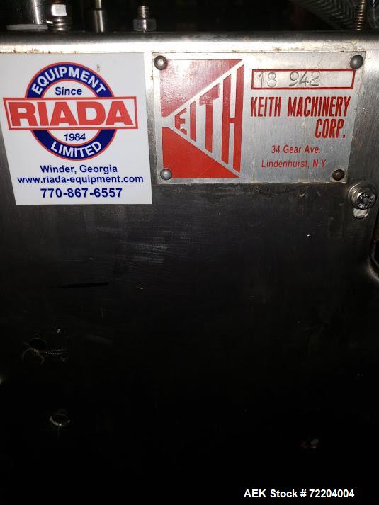 Used Keith Machinery Co Inline Piston Filler, Model RJM. Filler has 2-up positive shut-off design with pneumatic indexing. Front-mounted operator control panel.  Approx. 6 table top chain conveyor. S...