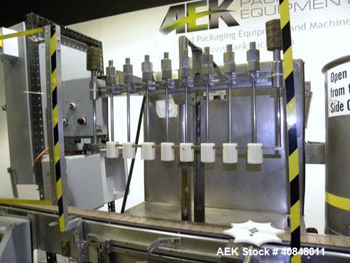 Used Filamatic (National Instruments) 8 Head In-Line Piston Filler, Model CVK-120. (8) 3/8’’ diameter nozzles with centering bells, mounted on a 31" wide adjustable slotted filling bar. Has bottom up...