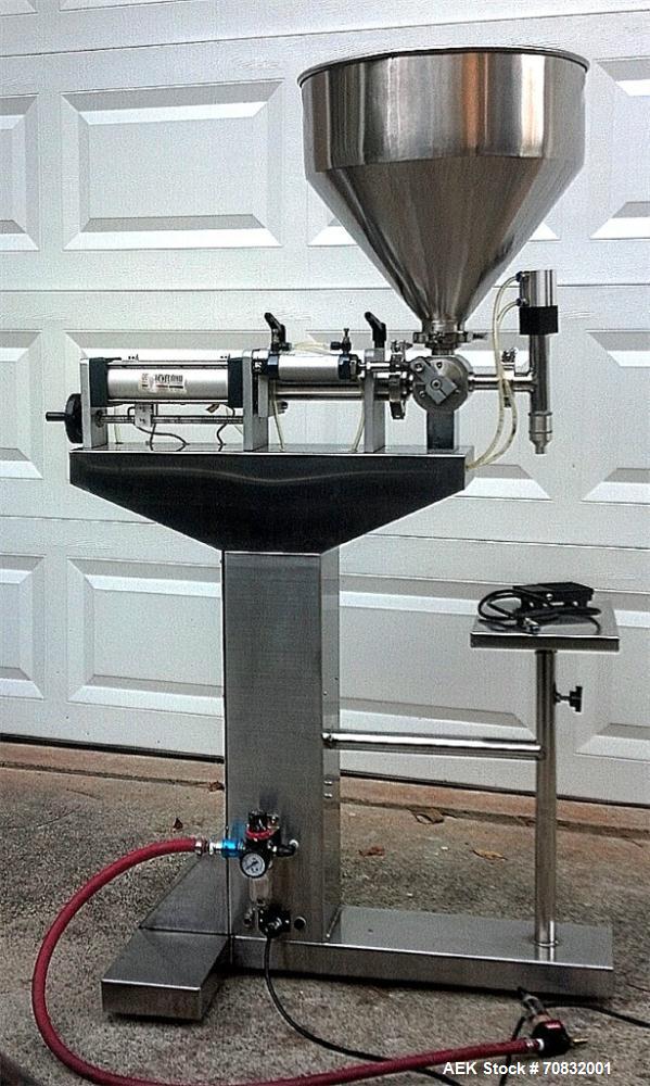 Used Cleveland Equipment LGGZ-250 Semi Automatic Piston Filler. Has fill range: 1.5 ot 8.5 oz. Free standing unit with foot pedal operation. Positive shut off nozzle. Ideally suited for liquids, past...