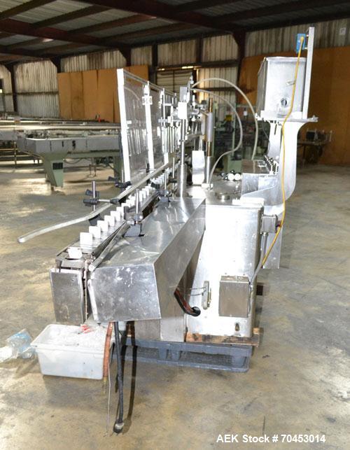 Used Cozzoli Model LF840-8 Inline Continuous Motion Walking Beam Style Piston Filler. Machine is capable of speeds from 40 to 120 containers per minute. Has integrated air cleaner. Container size ran...