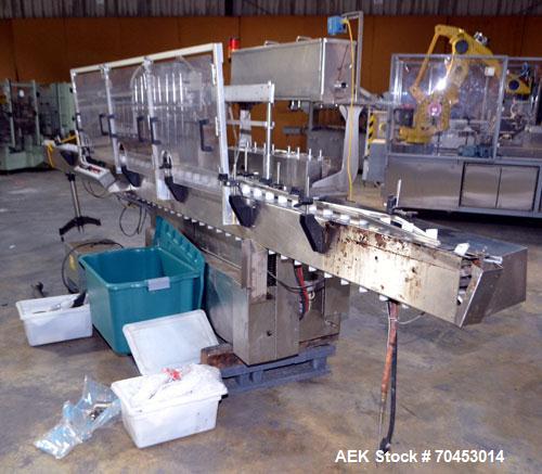 Used Cozzoli Model LF840-8 Inline Continuous Motion Walking Beam Style Piston Filler. Machine is capable of speeds from 40 to 120 containers per minute. Has integrated air cleaner. Container size ran...
