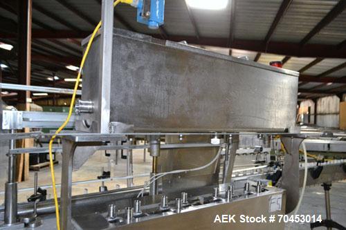 Used Cozzoli Model LF840-8 Inline Continuous Motion Walking Beam Style Piston Filler. Machine is capable of speeds from 40 to 120 containers per minute. Has integrated air cleaner. Container size ran...