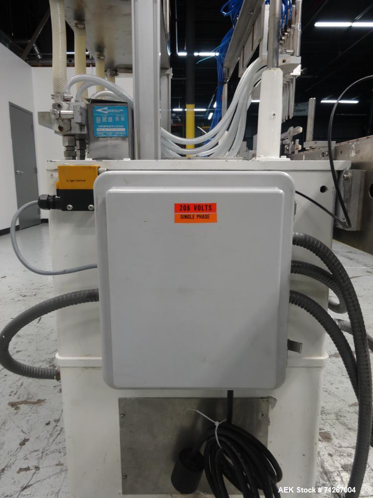 Used Cozzoli Model VR-840-8 Inline Piston Filler