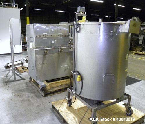 Used Filamatic (National Instruments) 10 Head In-Line Piston Filler, Model AL-800HS. No nozzles or centering bells, bottom up fill. (10) approximate 260cc pistons. Conveyor infeed and discharge. Incl...