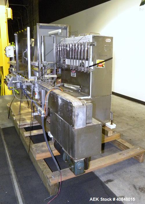 Used Filamatic (National Instruments) 12 Head In-Line Piston Filler, Model CVK-