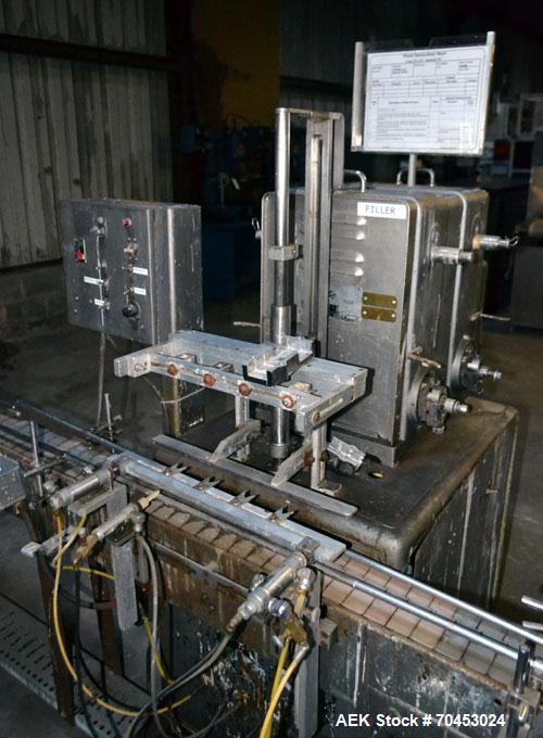 Used Filamatic DAB-16-4 Inline Piston Filler capable of speeds from 3 to 40 containers per minute. Fill size range: 3cc to 520cc (with changeparts). Will hold up to 4 x 520cc pistons (not included). ...