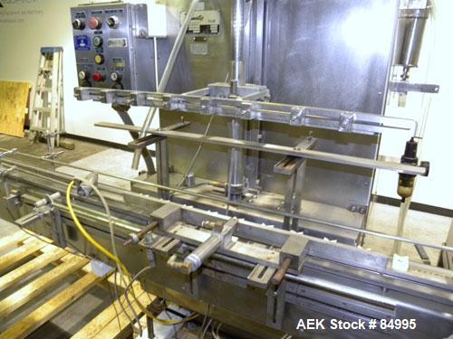 Used Filamatic Inline Piston Filler, Model CVK-300-1. Equipped with (8) 1000 cc pistons, all stainless steel. Automatic diving nozzle style, missing nozzles. Pneumatic container indexing. Self-contai...