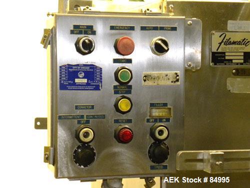 Used Filamatic Inline Piston Filler, Model CVK-300-1. Equipped with (8) 1000 cc pistons, all stainless steel. Automatic diving nozzle style, missing nozzles. Pneumatic container indexing. Self-contai...