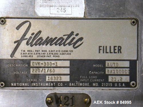 Used Filamatic Inline Piston Filler, Model CVK-300-1. Equipped with (8) 1000 cc pistons, all stainless steel. Automatic diving nozzle style, missing nozzles. Pneumatic container indexing. Self-contai...