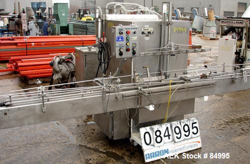 Used Filamatic Inline Piston Filler, Model CVK-300-1. Equipped with (8) 1000 cc pistons, all stainless steel. Automatic diving nozzle style, missing nozzles. Pneumatic container indexing. Self-contai...