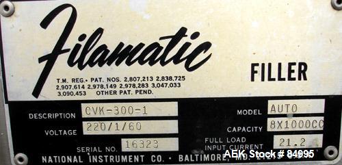 Used Filamatic Inline Piston Filler, Model CVK-300-1. Equipped with (8) 1000 cc pistons, all stainless steel. Automatic diving nozzle style, missing nozzles. Pneumatic container indexing. Self-contai...