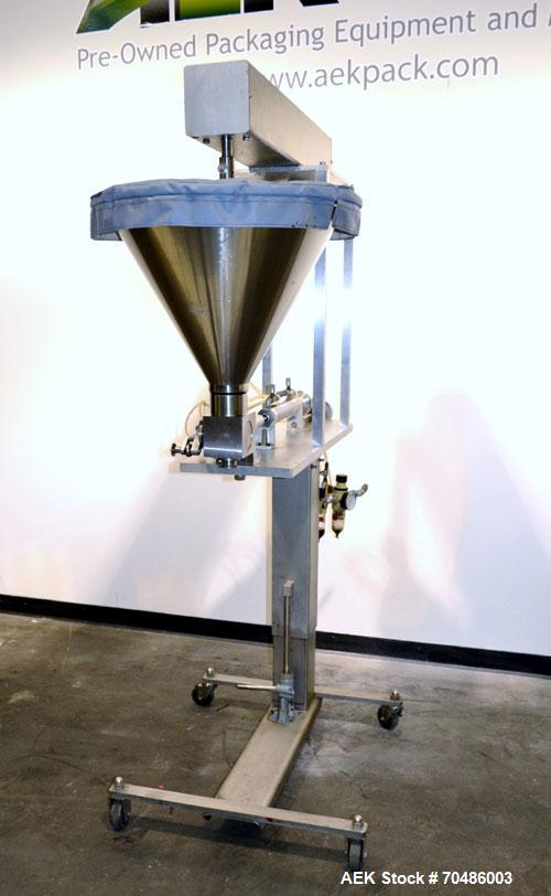Used Hinds-Bock Single Piston Filler/Depositer, Model SP-64, Stainless Steel. Capable of speeds from 10 to 20 containers per minute (depending on fill size). Fill size range: 1/2 oz to 64 oz with cha...