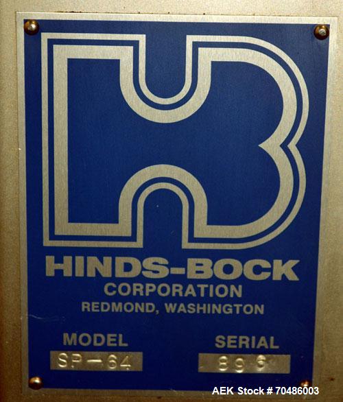 Used Hinds-Bock Single Piston Filler/Depositer, Model SP-64, Stainless Steel. Capable of speeds from 10 to 20 containers per minute (depending on fill size). Fill size range: 1/2 oz to 64 oz with cha...