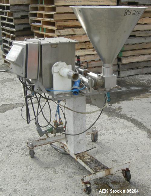 USED: Hinds Bock 6 oz stainless steel, pneumatically operated, piston filler. Currently equipped with a 1-1/2" diameter x 7" deep piston. Includes a stainless steel hopper and inline metal detector. ...