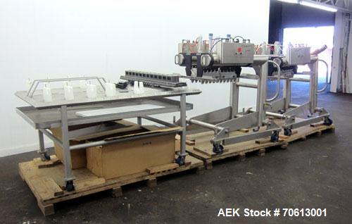 Used KOFAB Egg Depositer System, 304 Stainless Steel. (1) 25 Head filling station consisting of (4) 5 head manifolds on approximate 3” centers, 9" apart, with (4) air operated pistons. (1) Main filli...