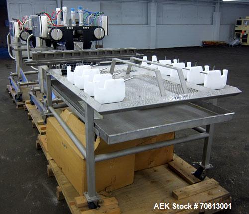 Used KOFAB Egg Depositer System, 304 Stainless Steel. (1) 25 Head filling station consisting of (4) 5 head manifolds on approximate 3” centers, 9" apart, with (4) air operated pistons. (1) Main filli...