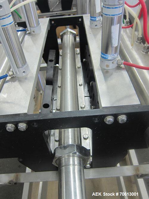 Used KOFAB Egg Depositer System, 304 Stainless Steel. (1) 25 Head filling station consisting of (4) 5 head manifolds on approximate 3” centers, 9" apart, with (4) air operated pistons. (1) Main filli...
