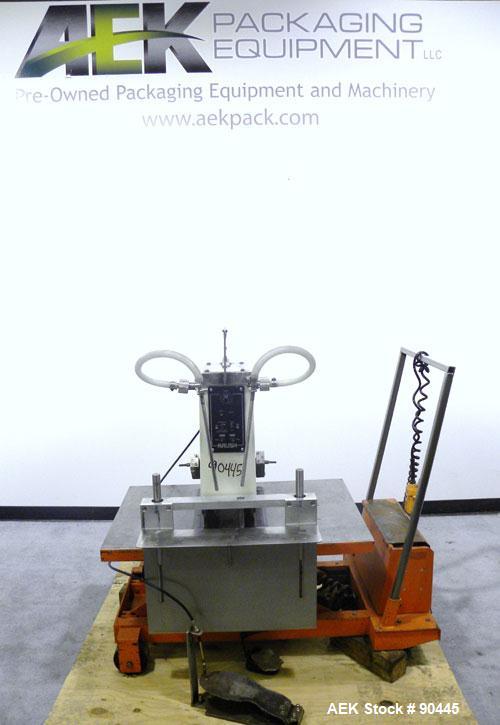 Used Kalish Semi-Automatic Twin Piston Filler, Model 2100. (2) Approximate (2) 3/8'' diameter tubes. Designed to run over a conveyor. Foot pedal controls. Driven by a 1/3 HP, 1/60/110 Volt motor. Mou...