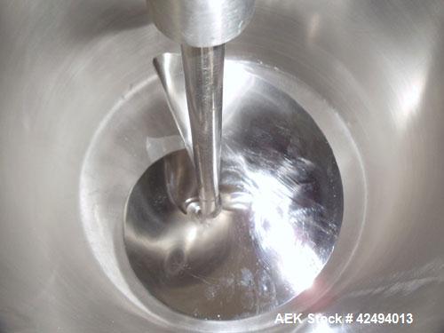 Used Kalix Single Head Piston Filler, Model 50MI, Stainless Steel. Single piston filling head, jacketed and agitated feed hopper, and foot pedal control. Mounted on a stand.