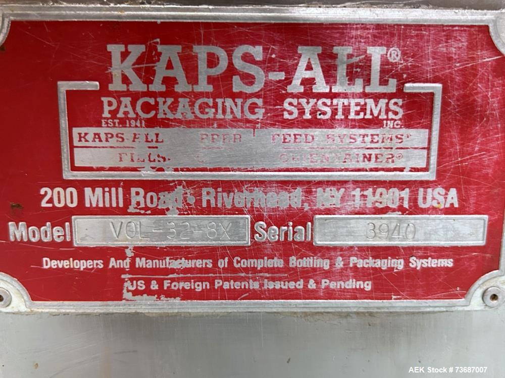 Used KapsAll Model VOL-32-8 Inline Piston Filler. (8) head units with 36oz pistons, positive shut-off nozzles, 6"W x 12'L conveyor with tabletop chain conveyor and pin indexing. Variable speed contro...