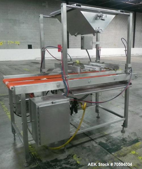 Used Quantum Model QTIA2000-12 Dual Lane Sauce Applicator. Twin piston design is rated at up to 120 pies per minute.  Machine has Allen Bradley controls.  Has continuous motion conveyors, sanitary de...
