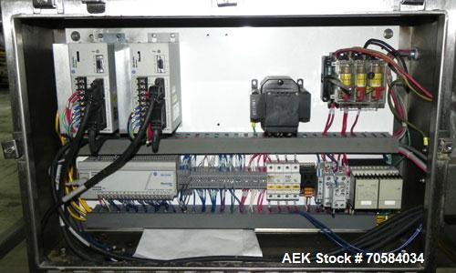 Used Quantum Model QTIA2000-12 Dual Lane Sauce Applicator. Twin piston design is rated at up to 120 pies per minute.  Machine has Allen Bradley controls.  Has continuous motion conveyors, sanitary de...