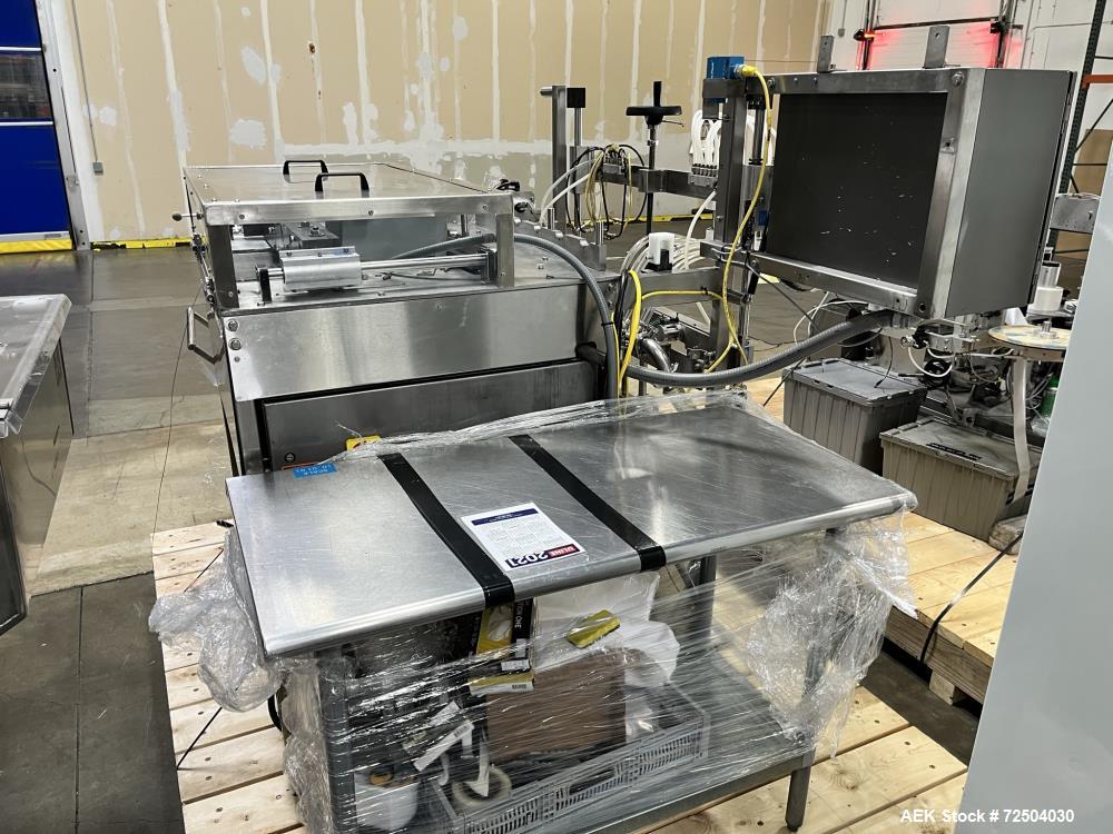 Used REB, Inc Automatic Inline Piston Filler, Model IVS. Current set up has 6 pistons with 6-diving fill nozzles. Is rated for speeds from 10 to 120 containers per minute (depending on container size...