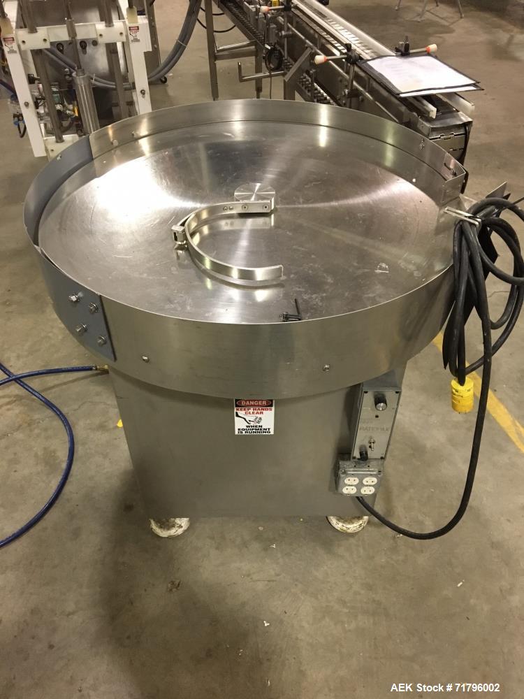 Used Simplex Model AS200 Twin Piston Filler and Accumulation Tables.