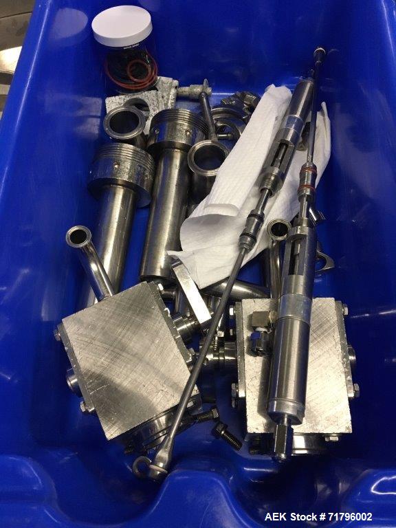 Used Simplex Model AS200 Twin Piston Filler and Accumulation Tables.