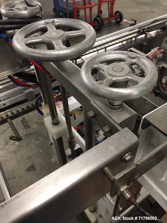 Used Simplex Model AS200 Twin Piston Filler and Accumulation Tables.