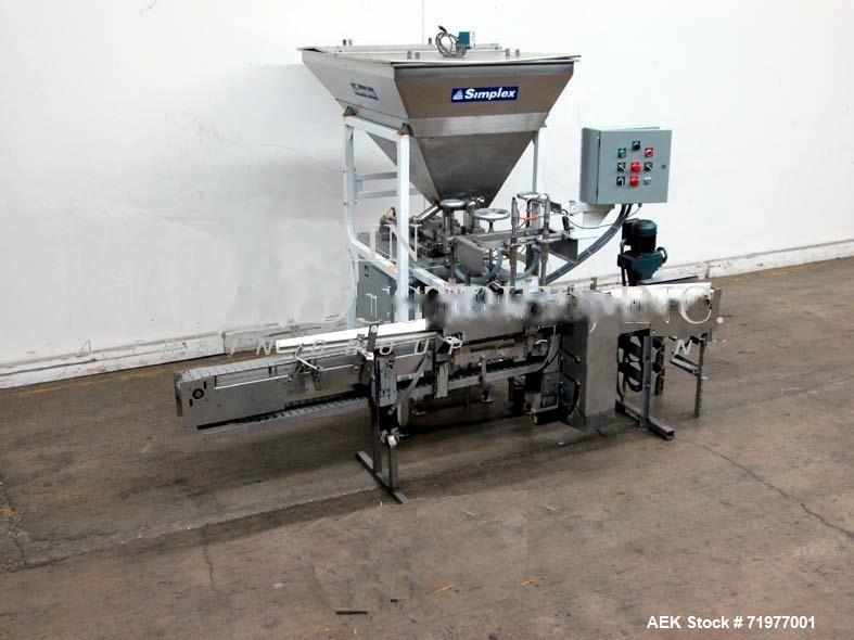 Used Simplex Model AS200, twin piston filler, rated from 5 to 15 cycles per minute – speeds dependent on materials, application and machine configuration. Fill range: up to 8.9 oz . Equipped with 4-1...
