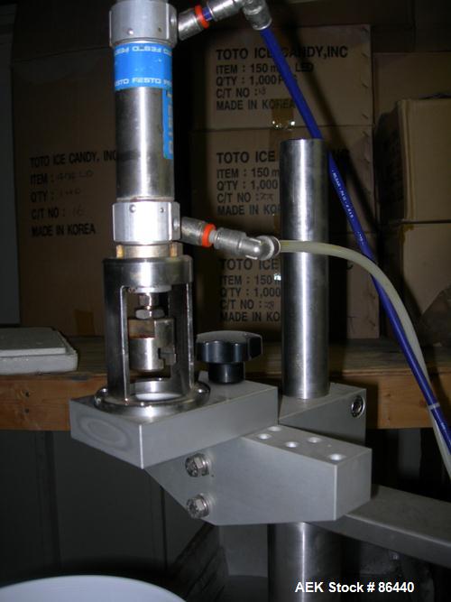 Used Technogel Ice Cream Doser Filling Machine, model Doser Desk, 304 stainless steel. Designed to fill containers of different shapes and sizes. The doser is the rotating spool type. 1.5 kw, 1/60/22...