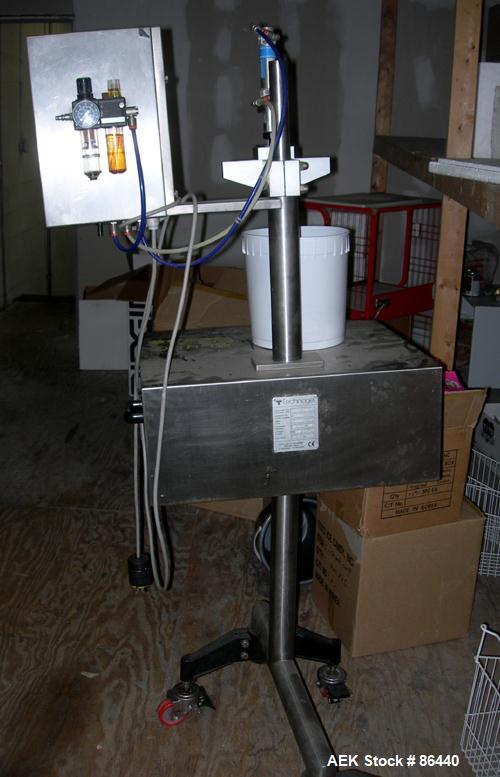 Used Technogel Ice Cream Doser Filling Machine, model Doser Desk, 304 stainless steel. Designed to fill containers of different shapes and sizes. The doser is the rotating spool type. 1.5 kw, 1/60/22...