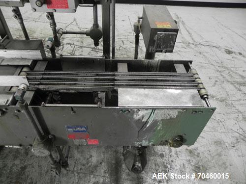 Used Thiele Model AF-2T-B1 Two Head PD Filler. Filler is designed to fill Quart to Gallon containers, (actual range 4 oz min to 185 oz maximum) at rates of 30-400 quart/min & 20-30 gallon/min. Each f...