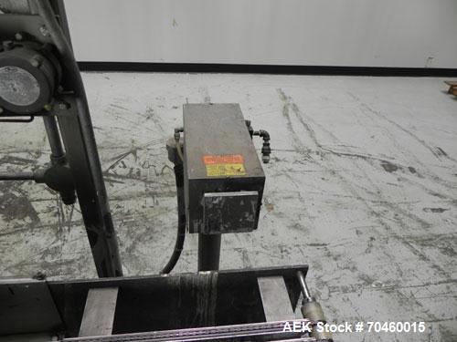 Used Thiele Model AF-2T-B1 Two Head PD Filler. Filler is designed to fill Quart to Gallon containers, (actual range 4 oz min to 185 oz maximum) at rates of 30-400 quart/min & 20-30 gallon/min. Each f...