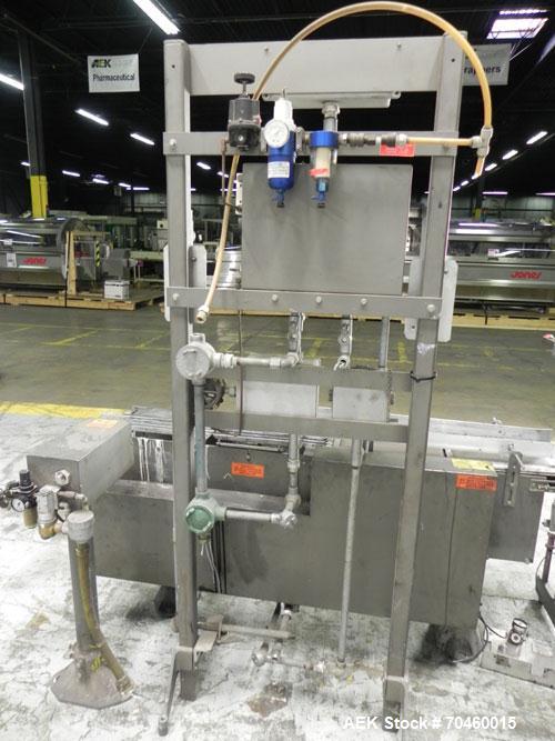 Used Thiele Model AF-2T-B1 Two Head PD Filler. Filler is designed to fill Quart to Gallon containers, (actual range 4 oz min to 185 oz maximum) at rates of 30-400 quart/min & 20-30 gallon/min. Each f...