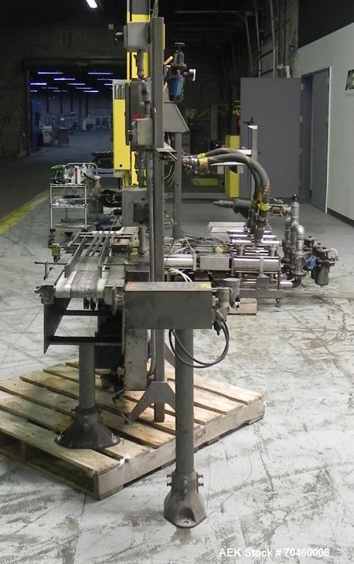 Used Thiele Model AF-3T-B1 Three Head PD Filler. Filler is designed to fill Quart to Gallon containers, (actual range 4 oz min to 185 oz maximum) at rates of 45 - 60 quart/min & 30-45 gallon/min. Eac...