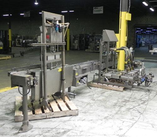 Used Thiele Model AF-3T-B1 Three Head PD Filler. Filler is designed to fill Quart to Gallon containers, (actual range 4 oz min to 185 oz maximum) at rates of 45 - 60 quart/min & 30-45 gallon/min. Eac...