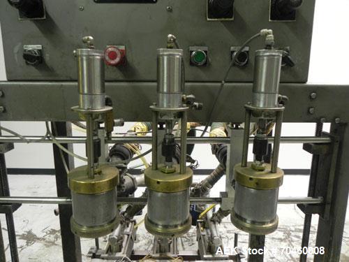 Used Thiele Model AF-3T-B1 Three Head PD Filler. Filler is designed to fill Quart to Gallon containers, (actual range 4 oz min to 185 oz maximum) at rates of 45 - 60 quart/min & 30-45 gallon/min. Eac...