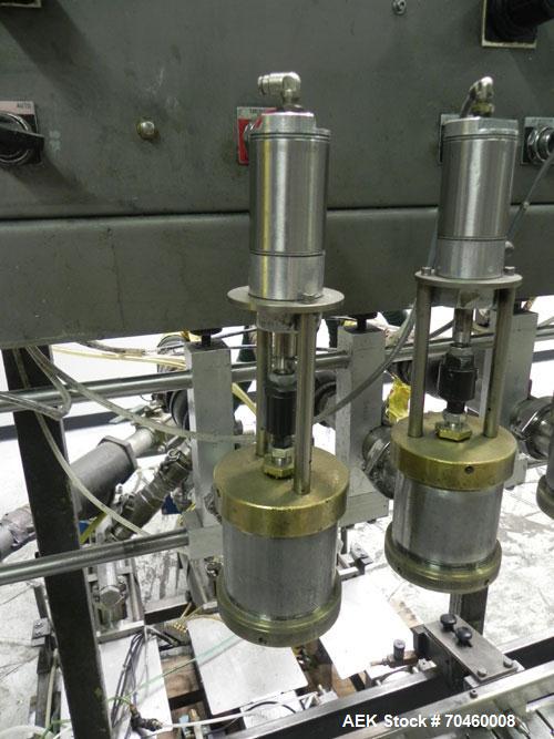 Used Thiele Model AF-3T-B1 Three Head PD Filler. Filler is designed to fill Quart to Gallon containers, (actual range 4 oz min to 185 oz maximum) at rates of 45 - 60 quart/min & 30-45 gallon/min. Eac...