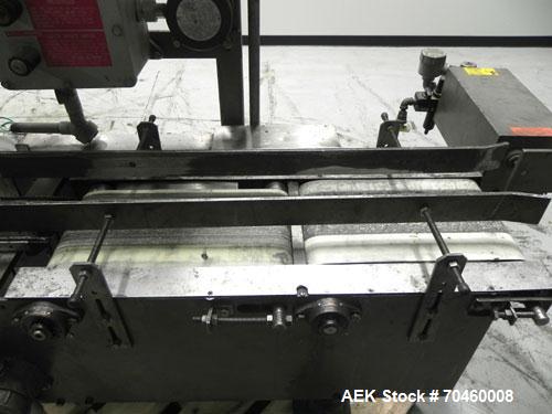 Used Thiele Model AF-3T-B1 Three Head PD Filler. Filler is designed to fill Quart to Gallon containers, (actual range 4 oz min to 185 oz maximum) at rates of 45 - 60 quart/min & 30-45 gallon/min. Eac...