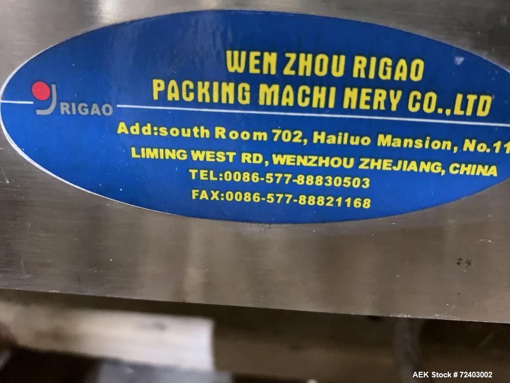 Used Wenzhou Rigao Table Top Semi Automatic Piston Filler, Model DYF. 316L Stainless steel product contact. Filling speed 5 to 20 bottles per minute. Filling accuracy /= 1% +/-. Filling range: approx...