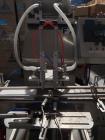 Used Keith Machinery Co Inline Piston Filler, Model RJM. Filler has 2-up positive shut-off design with pneumatic indexing. Front-mounted operator control panel.  Approx. 6 table top chain conveyor. S...