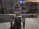 Used Keith Machinery Co Inline Piston Filler, Model RJM. Filler has 2-up positive shut-off design with pneumatic indexing. Front-mounted operator control panel.  Approx. 6 table top chain conveyor. S...
