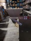 Used Keith Machinery Co Inline Piston Filler, Model RJM. Filler has 2-up positive shut-off design with pneumatic indexing. Front-mounted operator control panel.  Approx. 6 table top chain conveyor. S...