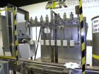 Used Filamatic (National Instruments) 8 Head In-Line Piston Filler, Model CVK-120. (8) 3/8’’ diameter nozzles with centering bells, mounted on a 31