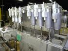 Used Filamatic (National Instruments) 8 Head In-Line Piston Filler, Model CVK-120. (8) 3/8’’ diameter nozzles with centering bells, mounted on a 31